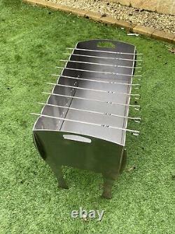 Portable Flat Pack Fire Pit With Grill And Skewers