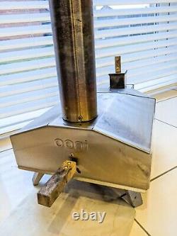 Used OONI 3 Wood Fired Outdoor Pizza Oven with Baking Stone, Peel and Pellets