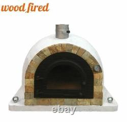 Four à pizza extérieur en brique avec foyer au bois de 100 cm, modèle Pro de luxe avec porte en fonte à aspect pierre naturelle.
